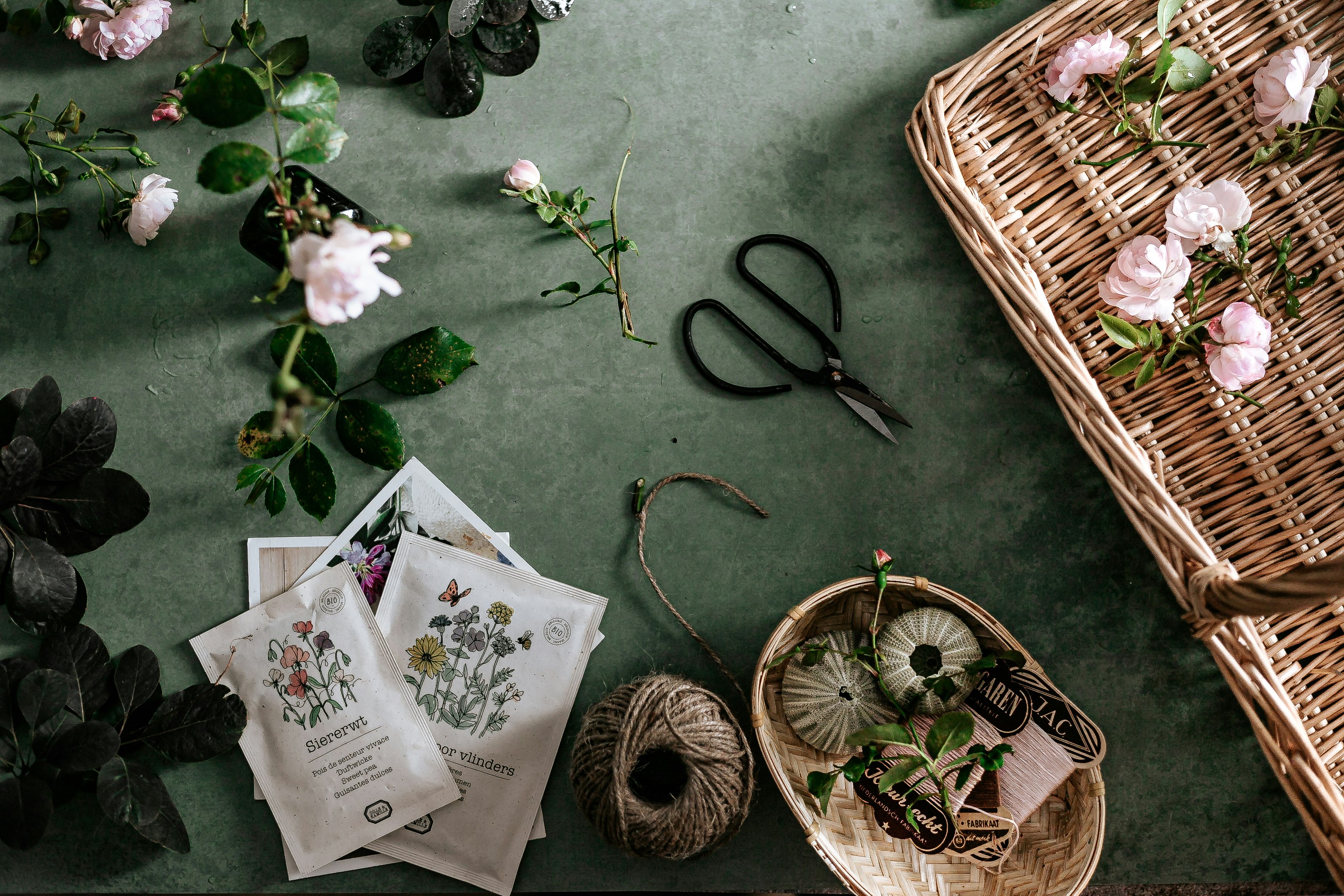 brown woven basket with green leaves